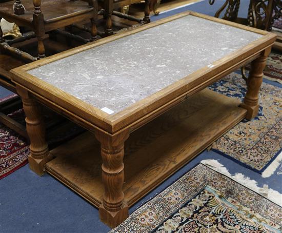 An oak and fossil marble coffee table W.135cm